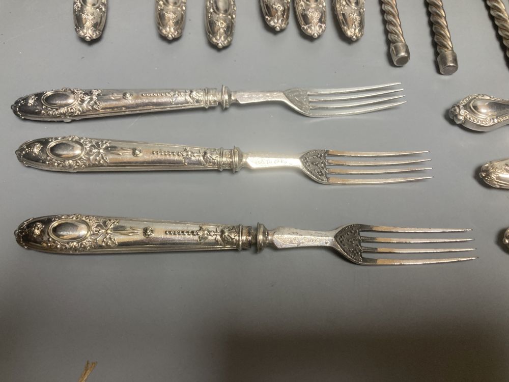 Twelve plated toasting forks and a set of six Victorian Elkington Mason & Co plated dessert knives and forks